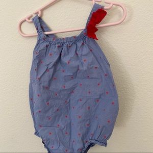 blue romper with red bow